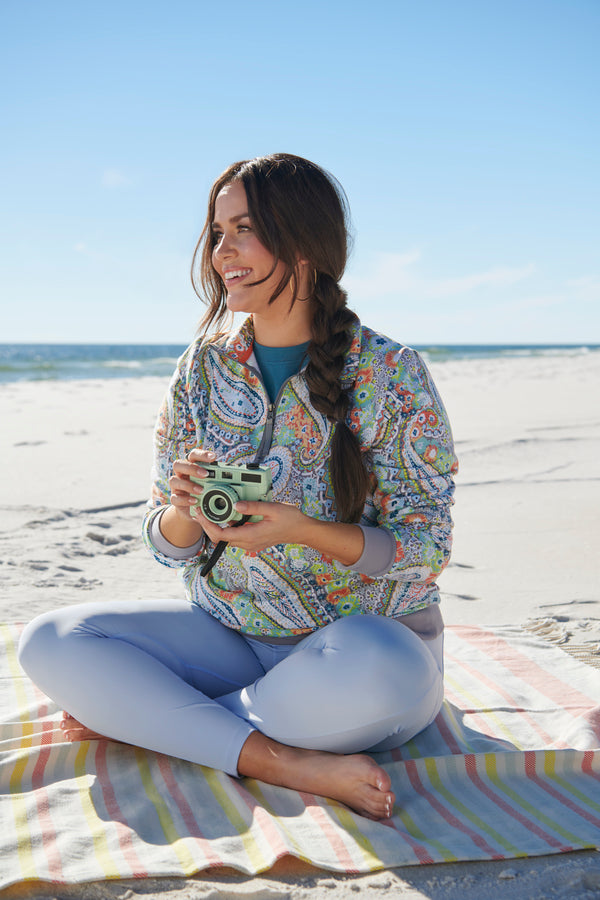 Woman sitting on beach